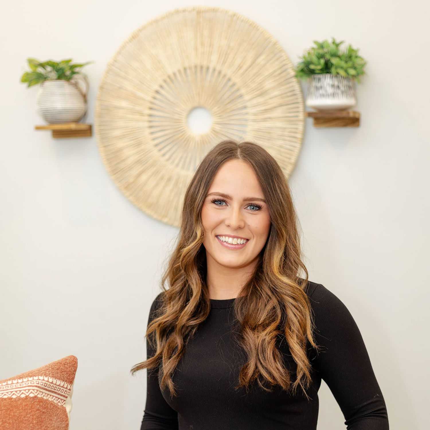 Portrait of Dianna A., a professional stylist at CARMA salon & spa, showcasing their expertise and style.